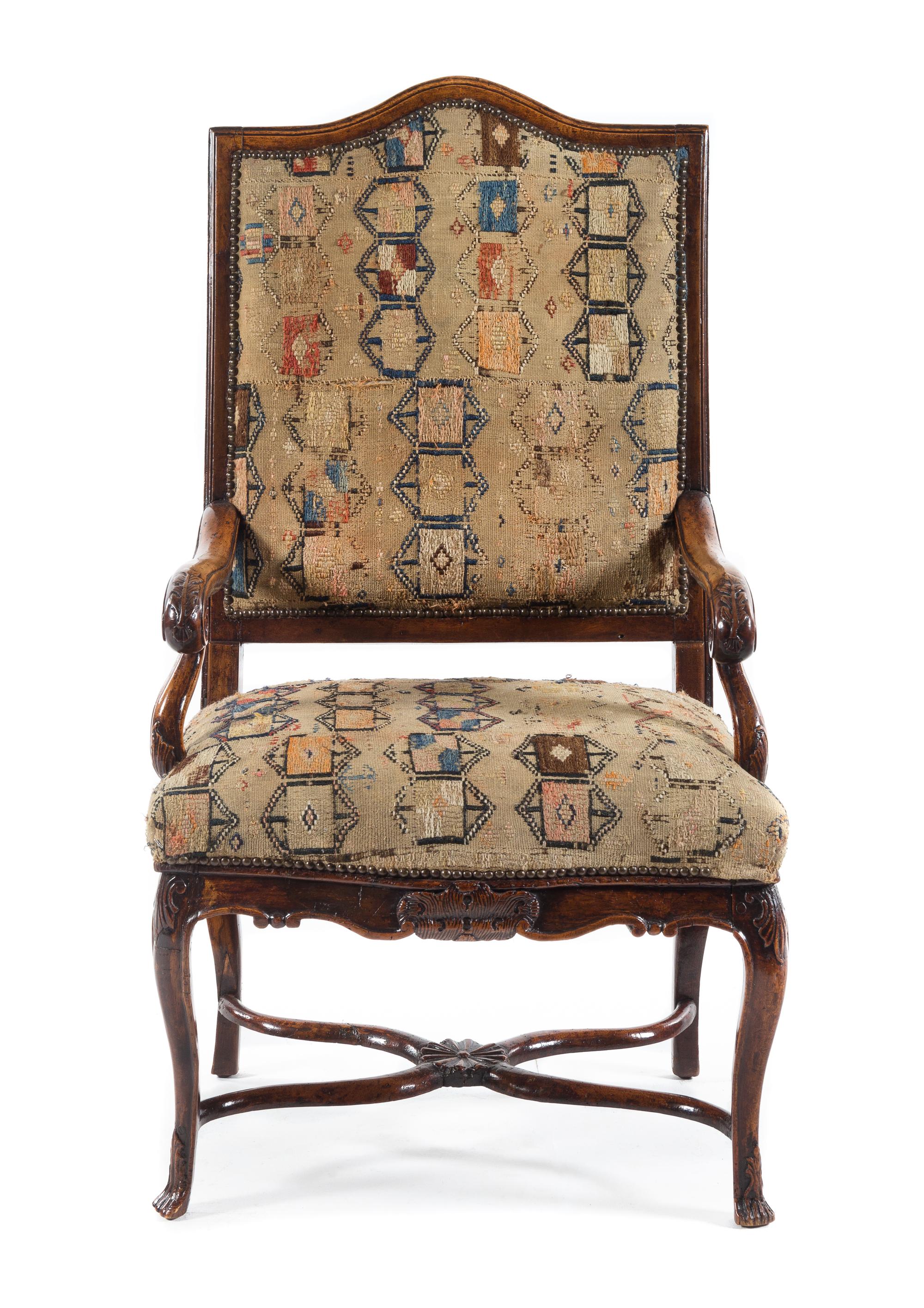 A Regence Walnut Open Armchair Height 48 1/2 inches. — 18TH CENTURY