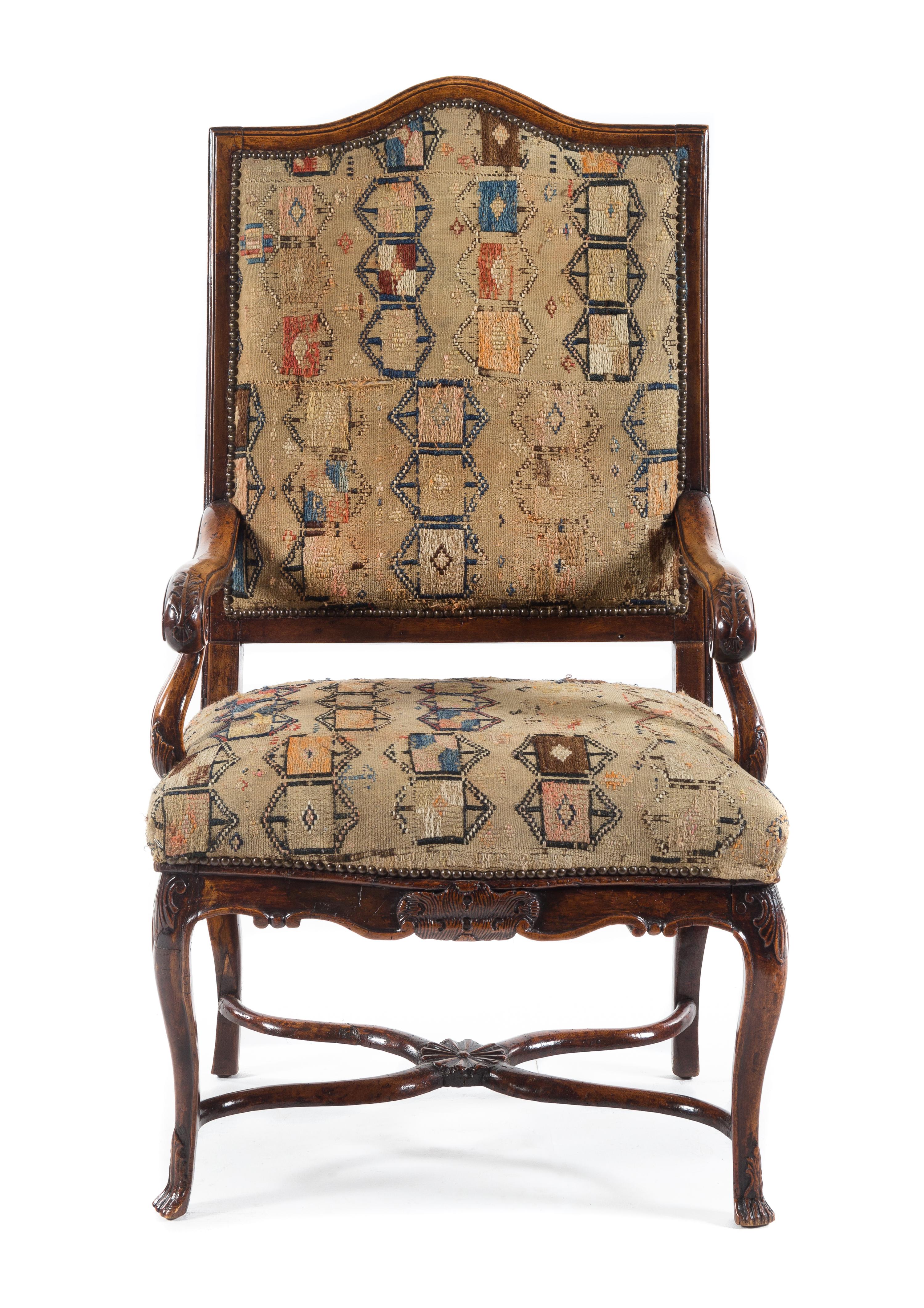 A Regence Walnut Open Armchair Height 48 1/2 inches. — 18TH CENTURY