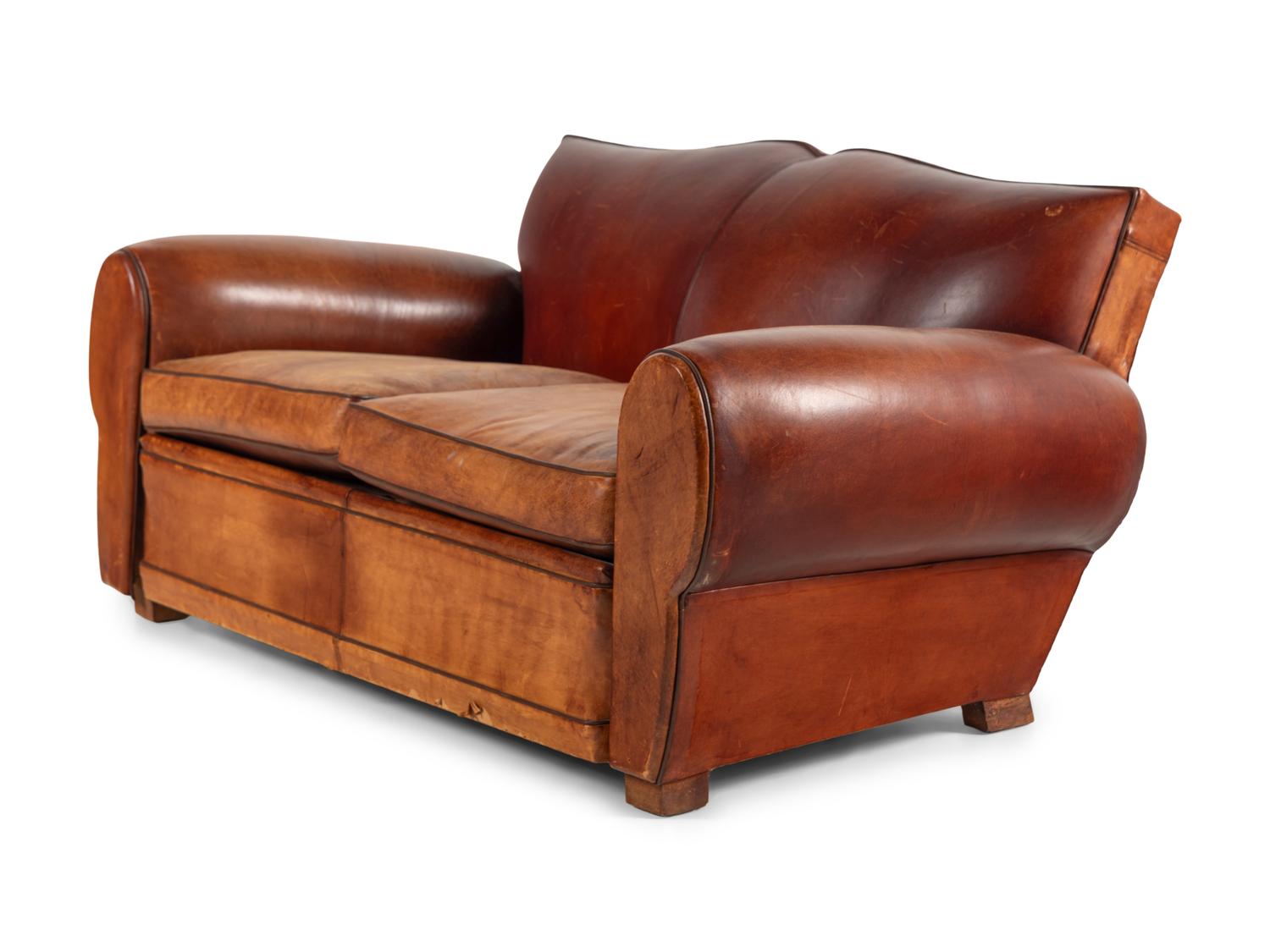 An Art Deco Three-Piece Leather Seating Suite