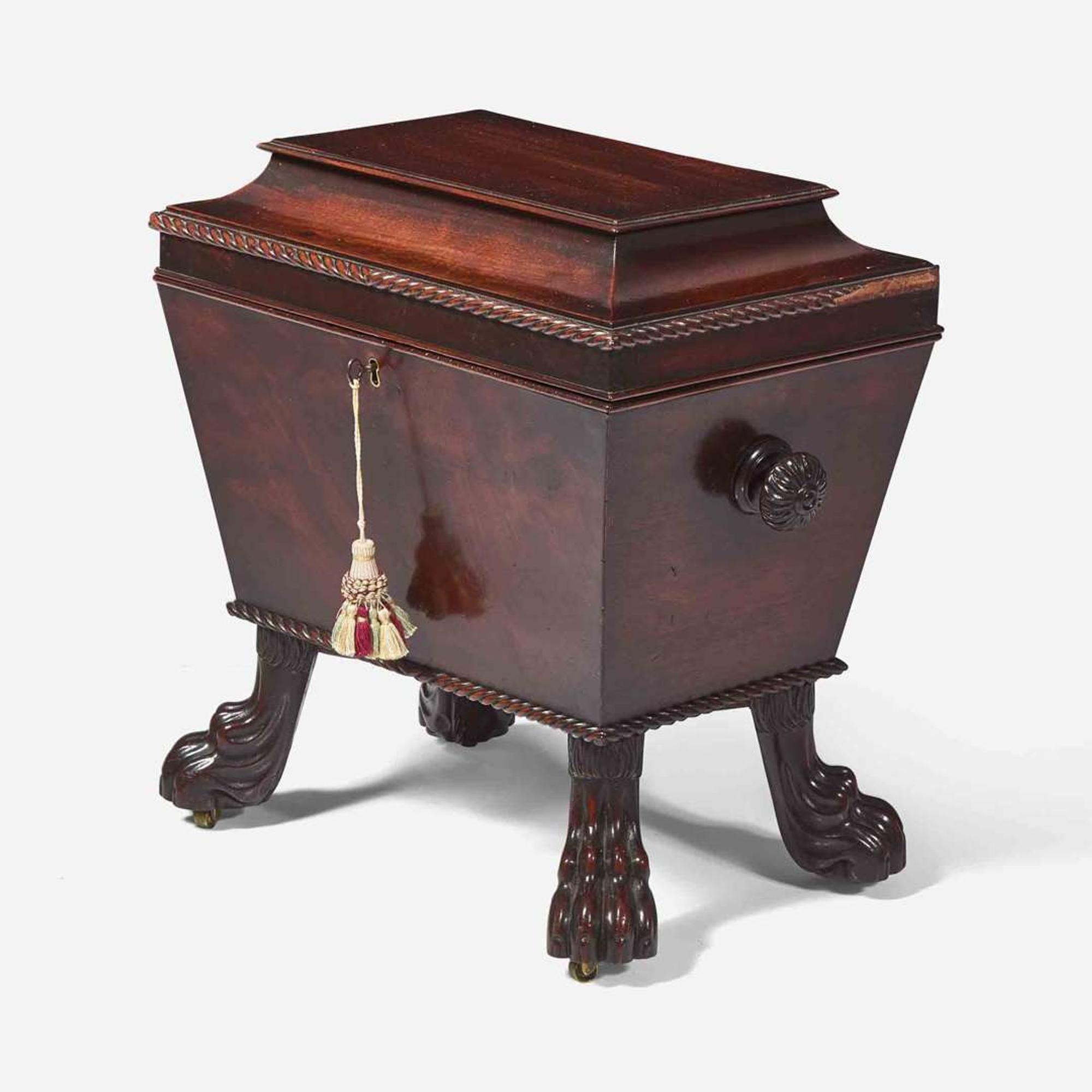 A Regency carved mahogany cellarette early 19th century