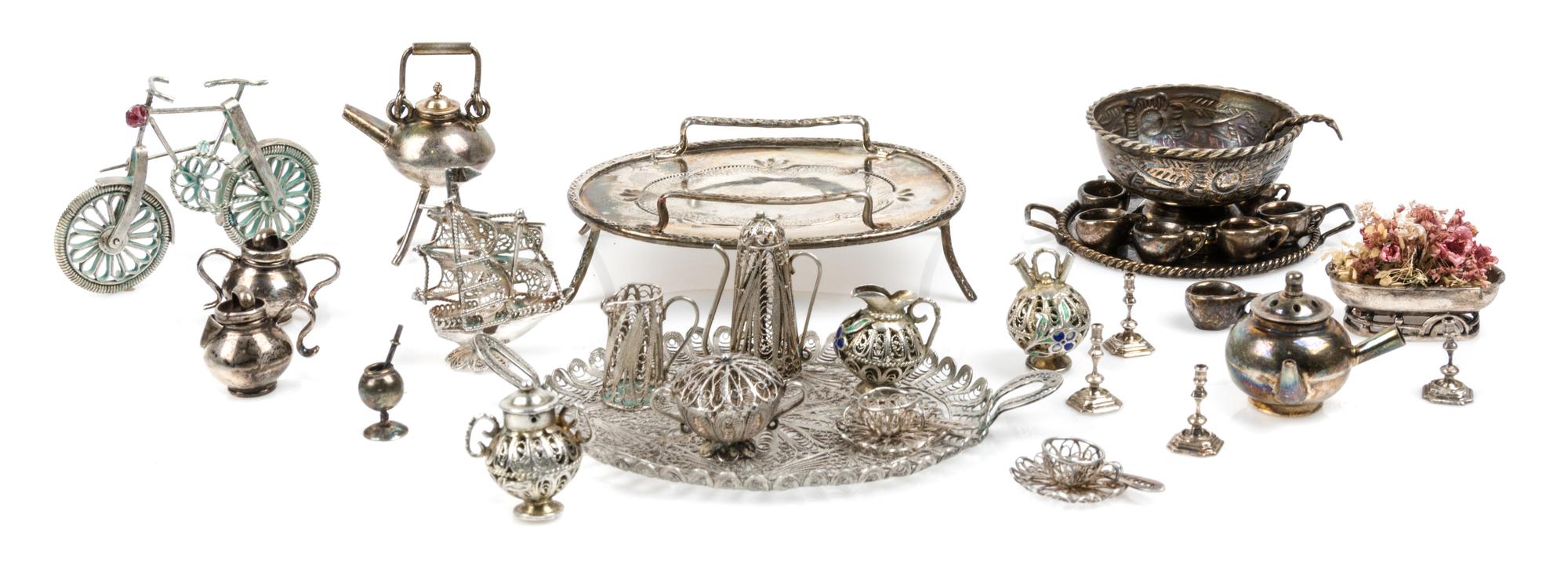 A Collection of Silver and Silvered Metal Table Articles Width of widest serving tray 3 1/2 inches. — Various Makers