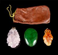 Three Chinese Hardstone Pendents