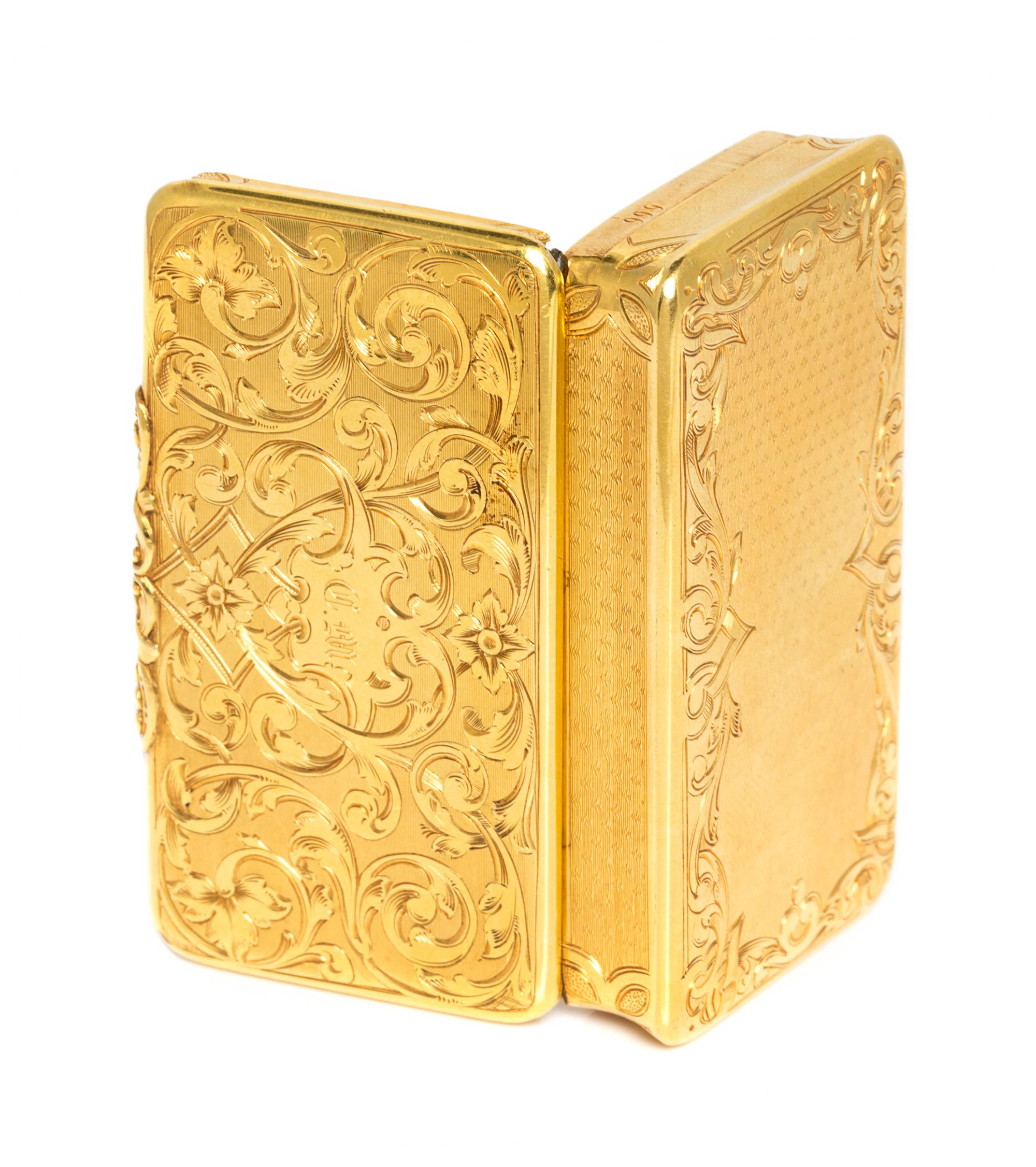 A French 18 Karat Gold Snuff Box, Possibly Louis Tassin, Paris, the lid worked with foliate volute and floral elements and centered by