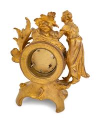 A Louis XV Style Gilt Metal Figural Clock with German Movement