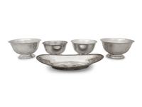 A Group of Four American Silver Revere Style Bowls and an Oval Dish