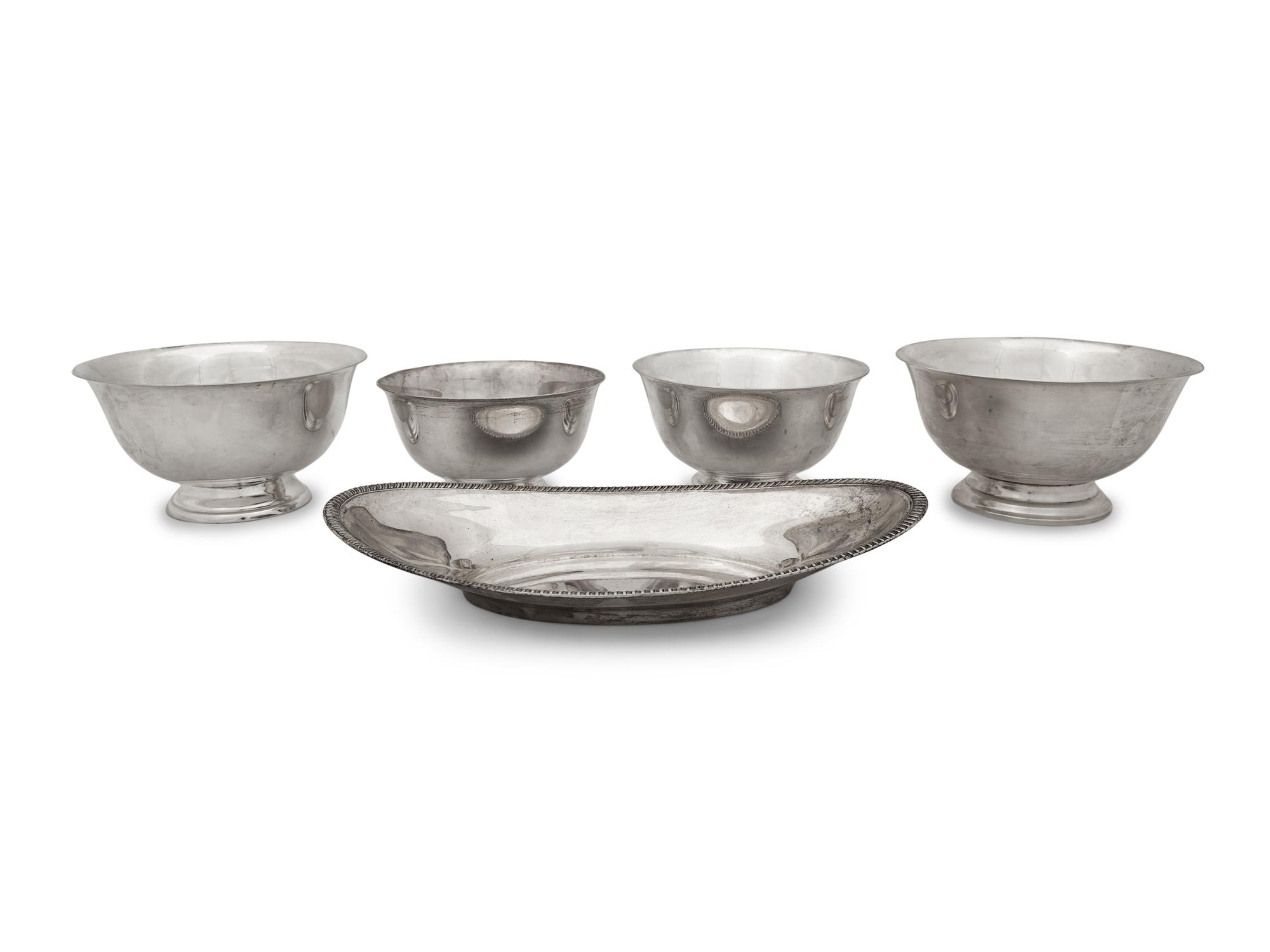 A Group of Four American Silver Revere Style Bowls and an Oval Dish