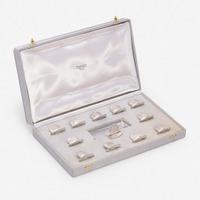 A Cased Set of Twelve French Silver Place Card Holders Ravinet Louis & Denfert Charles, retailed by Hermès, Paris, mid 20th century