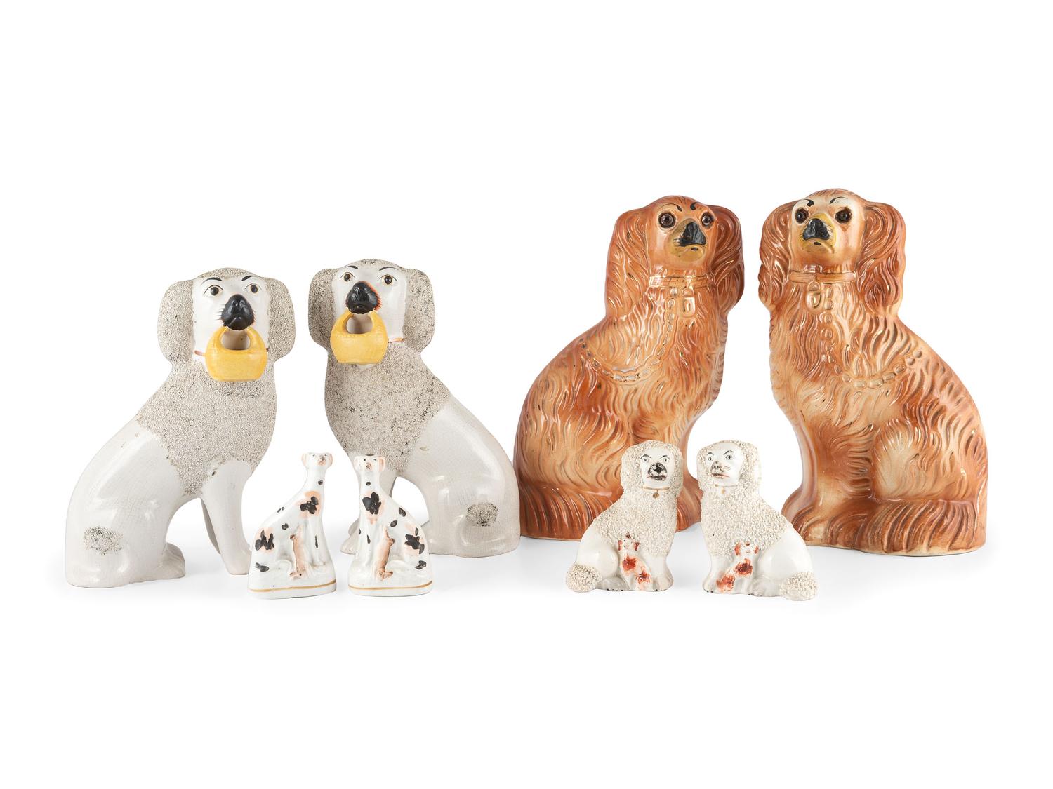 Eight Staffordshire Glazed Earthenware Hounds and Spaniels
