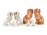 Eight Staffordshire Glazed Earthenware Hounds and Spaniels