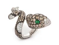 An 18 Karat White Gold, Diamond, Colored Diamond, Black Diamond and Tsavorite Garnet Snake Ring, 18.40 dwts.