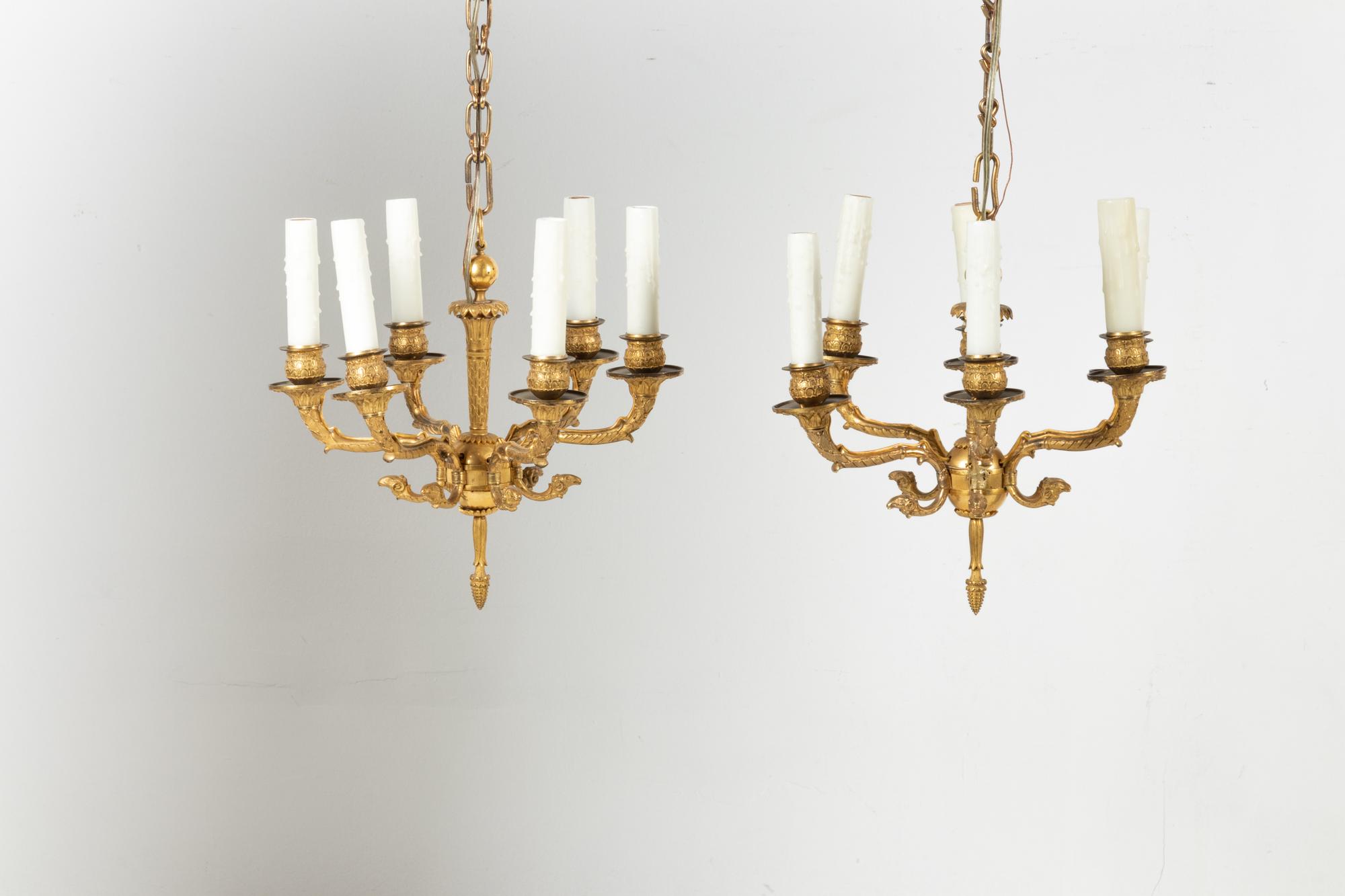 A Pair of Empire Gilt Bronze Six-Light Chandeliers