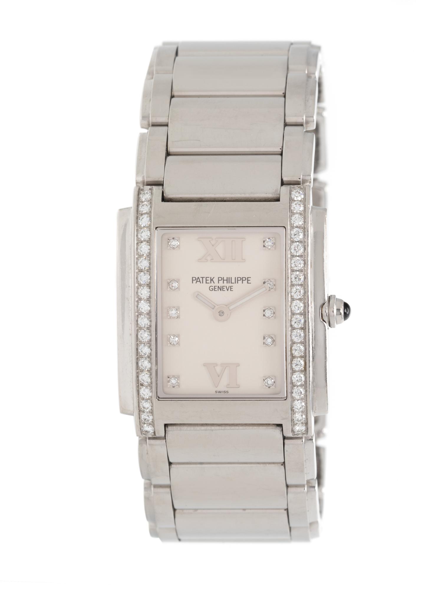 PATEK PHILIPPE, REF. 4910/10A-011 STAINLESS STEEL AND DIAMOND 'TWENTY-4' WATCH