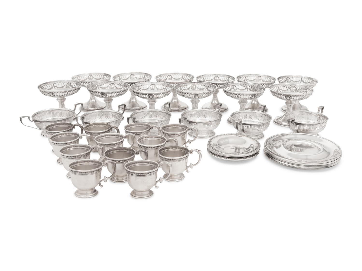 A Group of American Silver Cups and Saucers