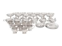 A Group of American Silver Cups and Saucers