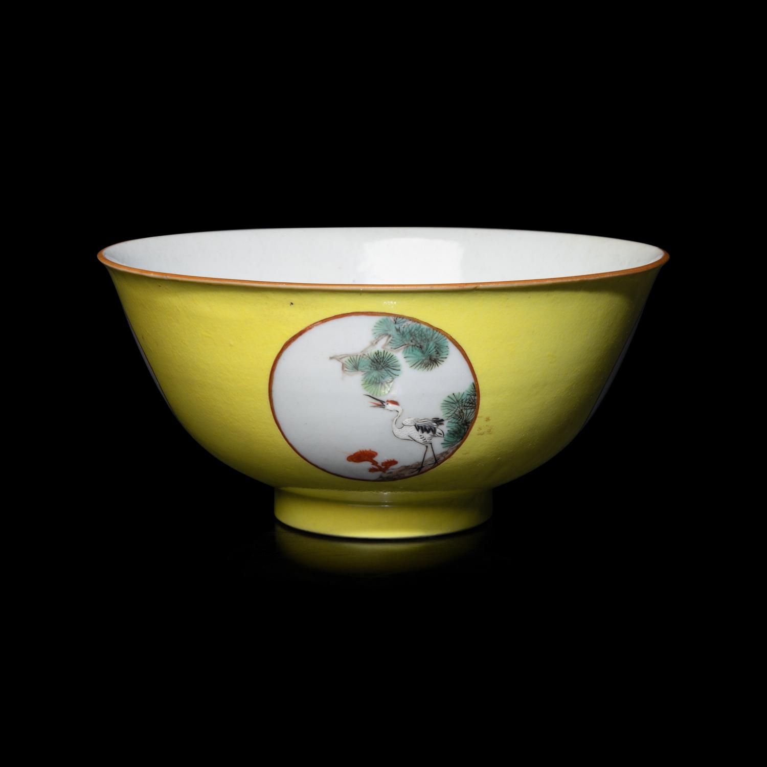 A Chinese Yellow Ground 'Medallion' Porcelain Bowl, Qing Dynasty, 18th Century or Later 清中期 黃地粉彩開光松鶴延年圖碗