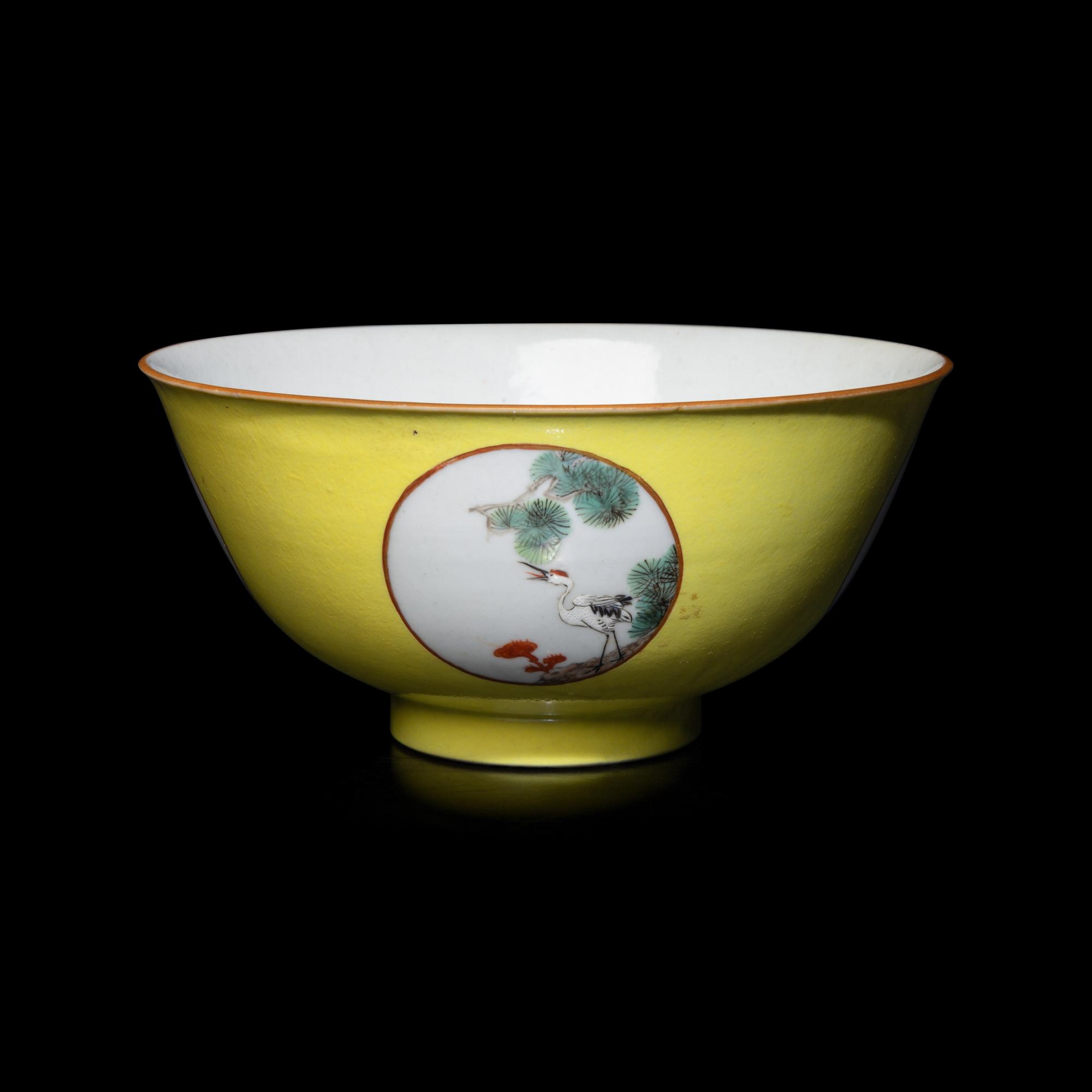 A Chinese Yellow Ground 'Medallion' Porcelain Bowl, Qing Dynasty, 18th Century or Later 清中期 黃地粉彩開光松鶴延年圖碗