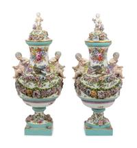 A Pair of Continental Porcelain Urns