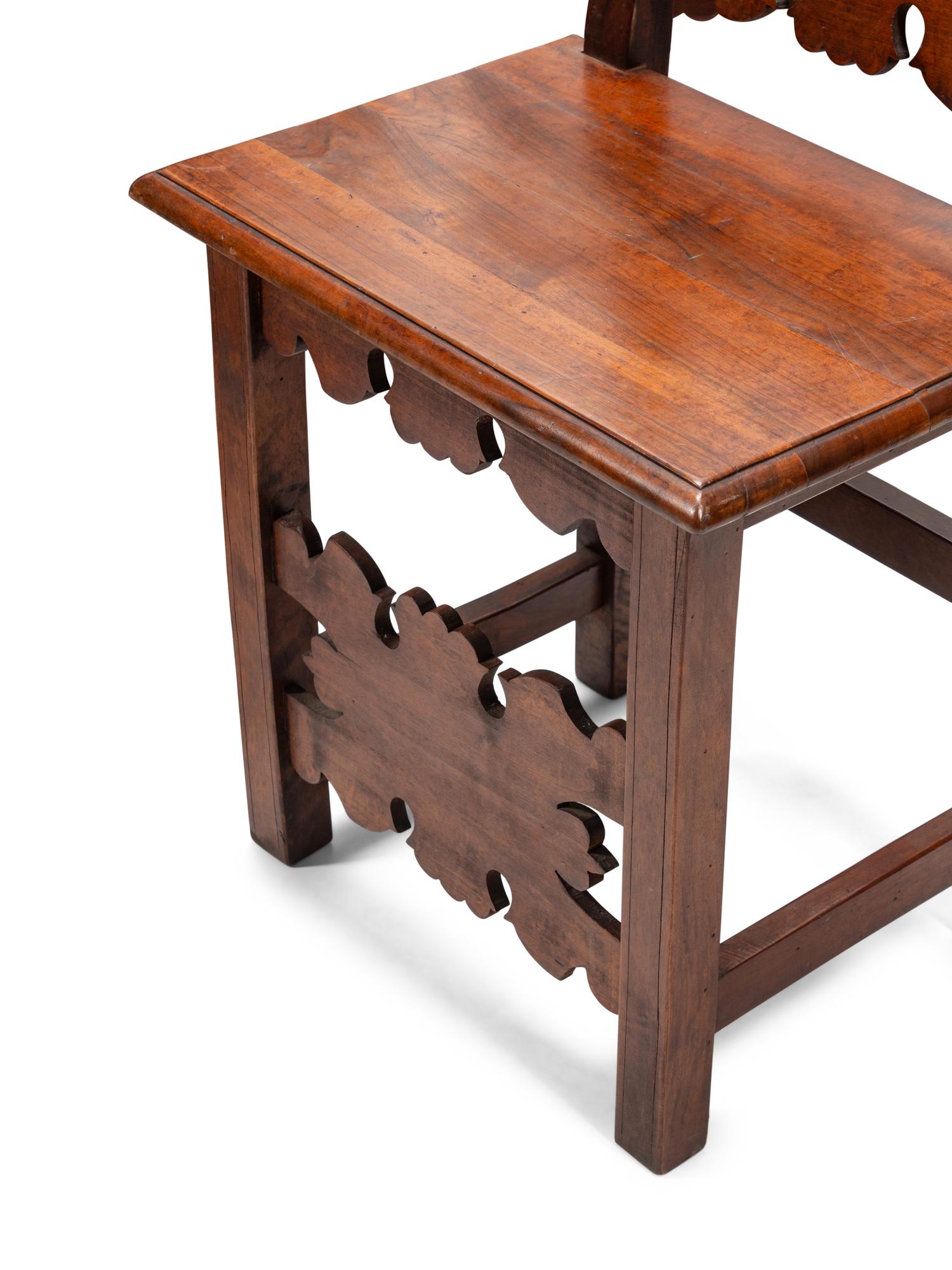 A Set of Eight Continental Baroque Style Walnut Chairs