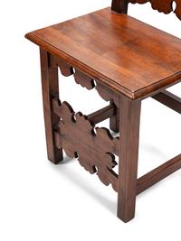 A Set of Eight Continental Baroque Style Walnut Chairs