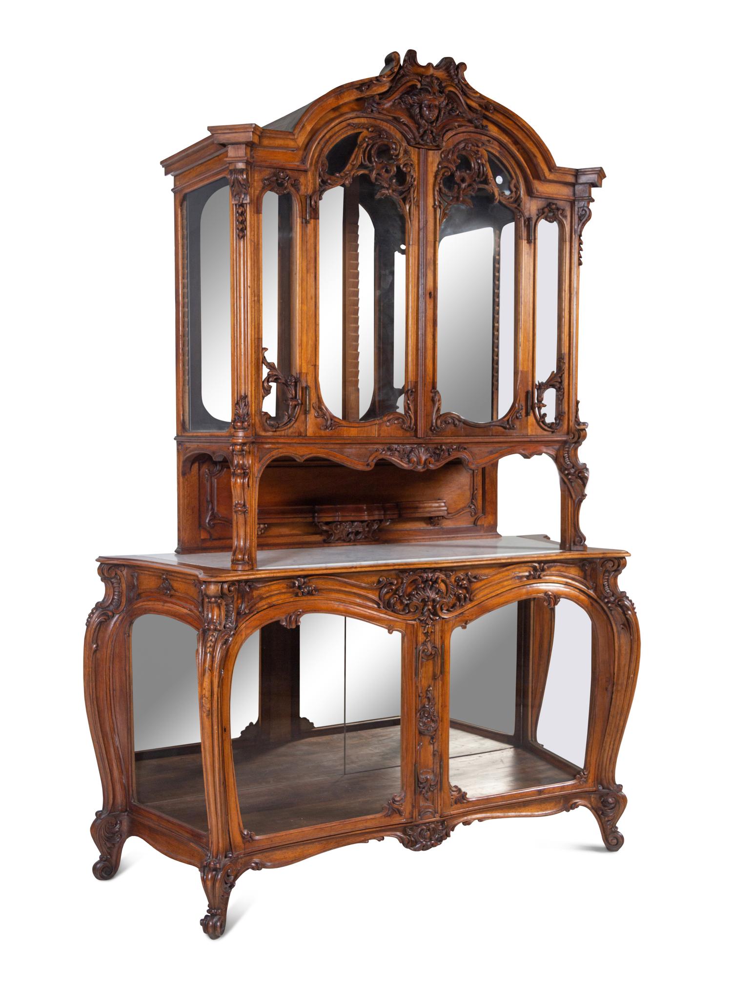 A Louis XV Style Carved Walnut Buffet à Deux Corps