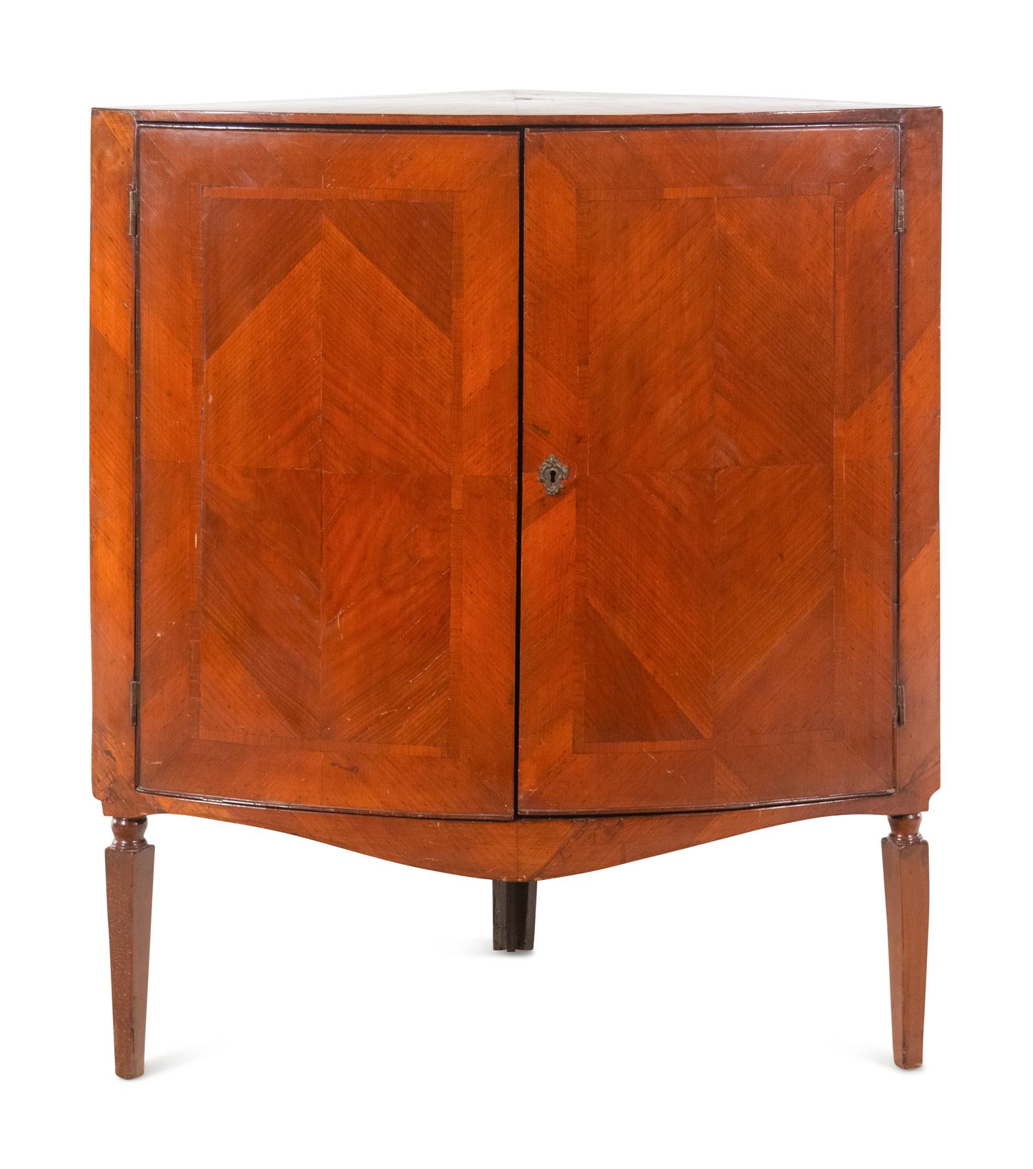 A Continental Bookmatch Veneered Corner Cabinet