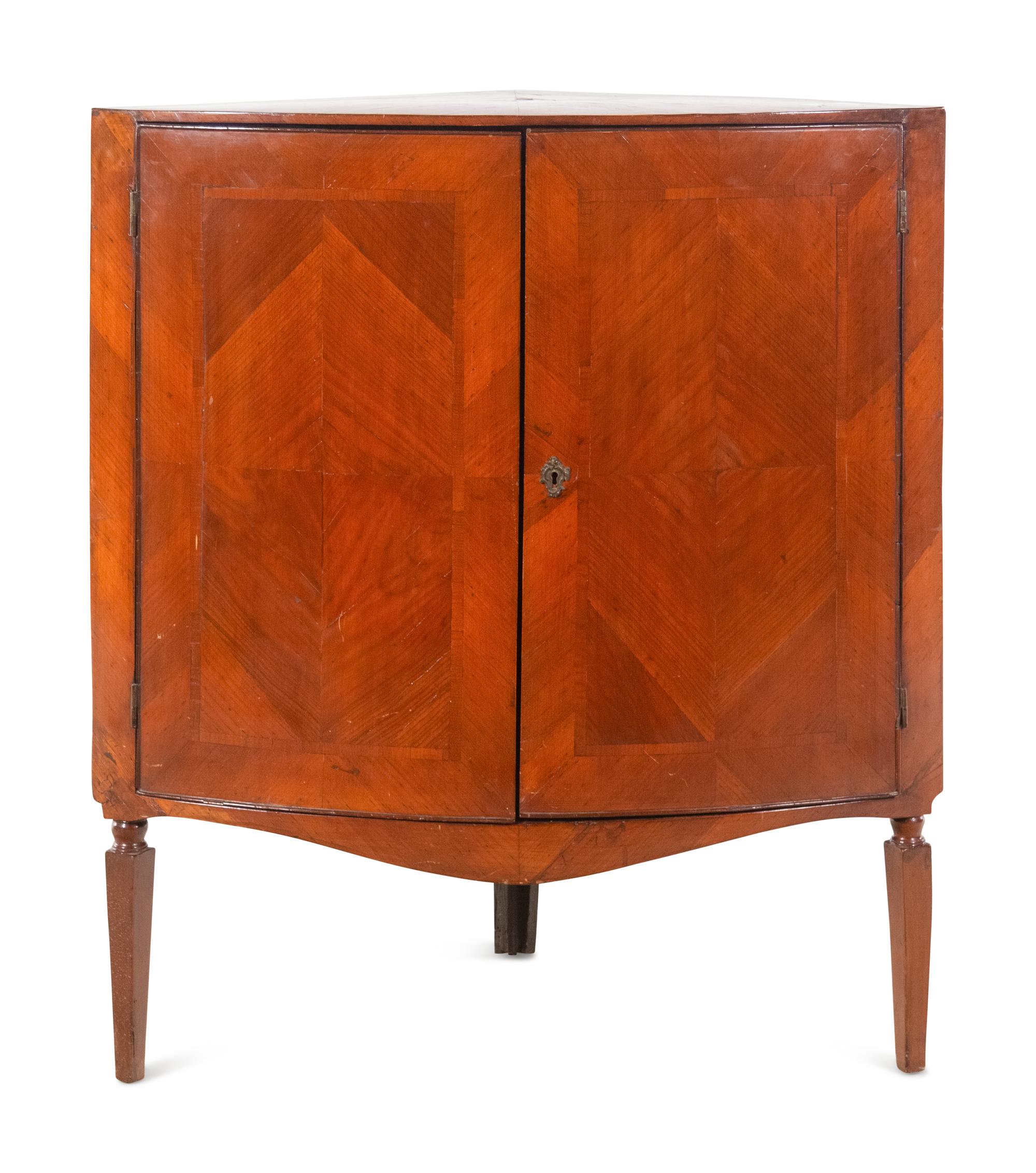 A Continental Bookmatch Veneered Corner Cabinet