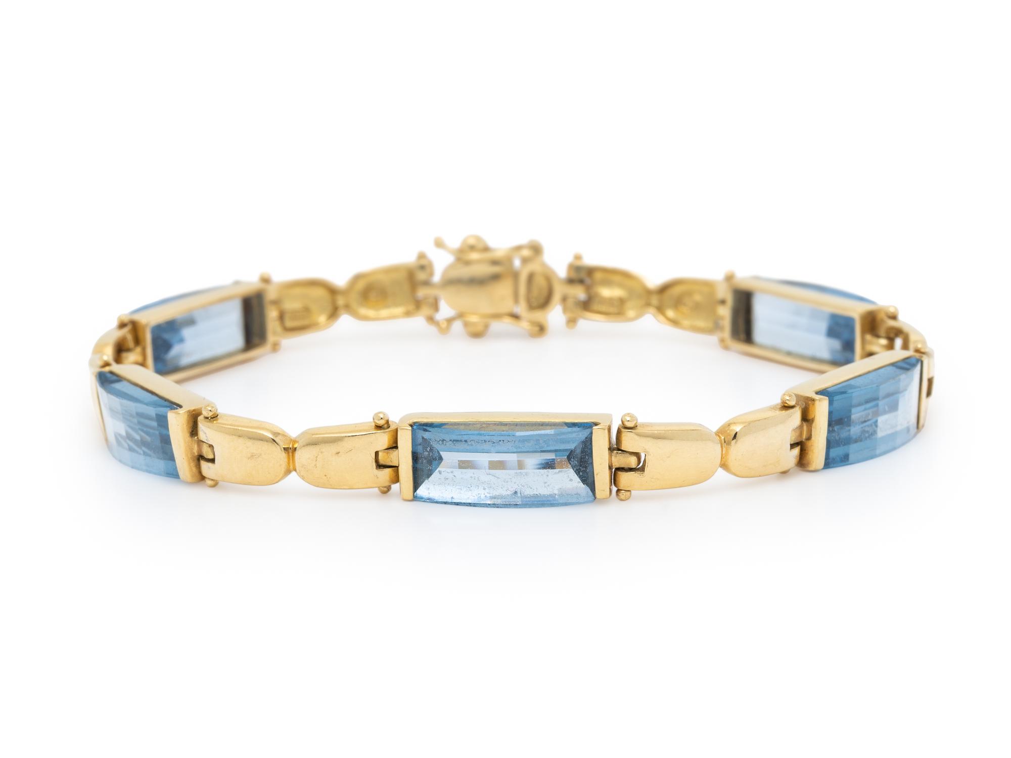 YELLOW GOLD AND SYNTHETIC BLUE SPINEL BRACELET
