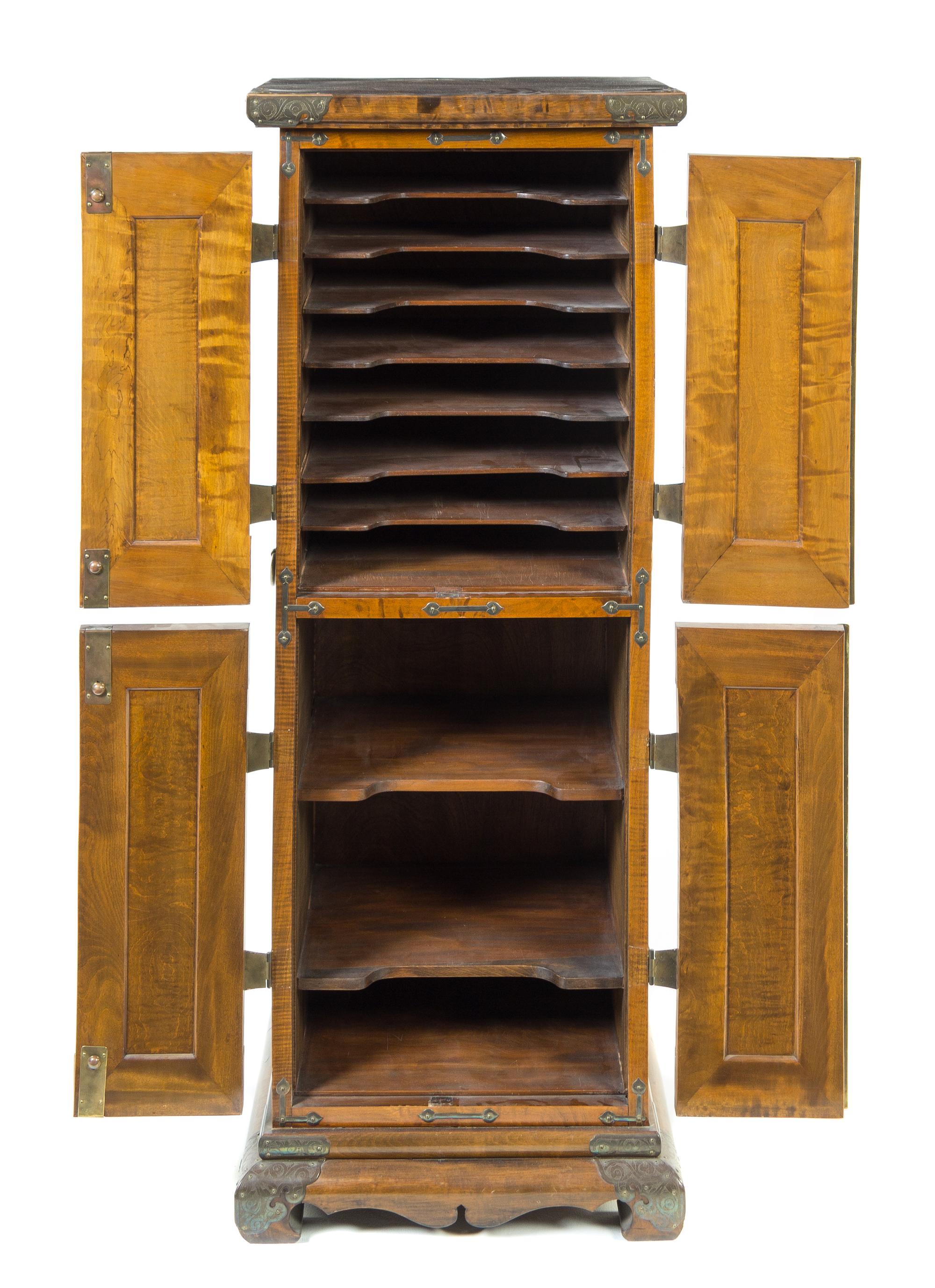 A Japanese Tsuba Inset Zelkova Wood Cabinet Height 51 1/2 x width 20 x depth 16 1/2 inches. — TSUBA: 19TH CENTURY; CABINET: LATE 19TH/EARLY 20TH CENTURY