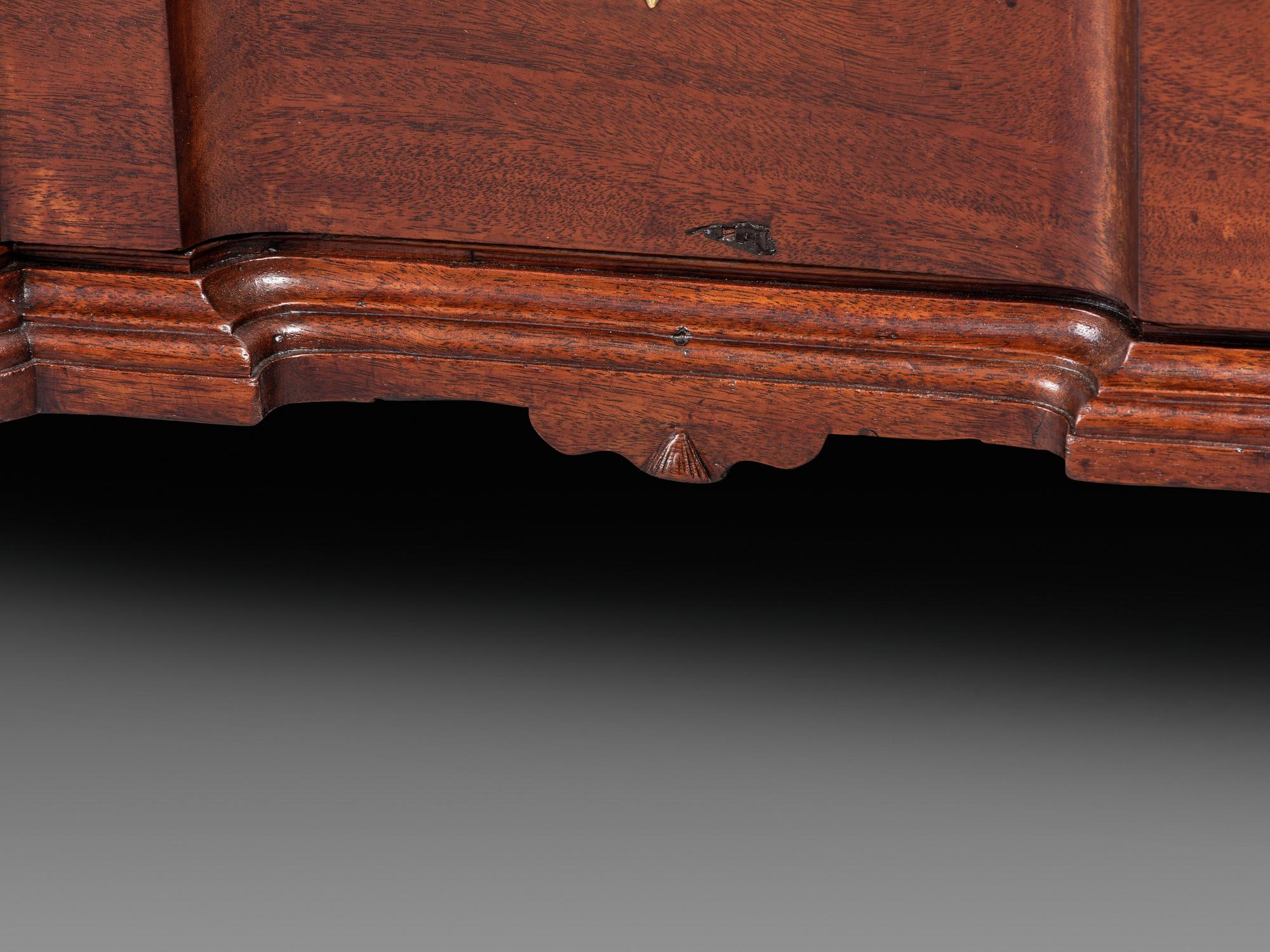 A Chippendale Figured Mahogany Block-Front Claw-and-Ball Foot Slant-Front Desk