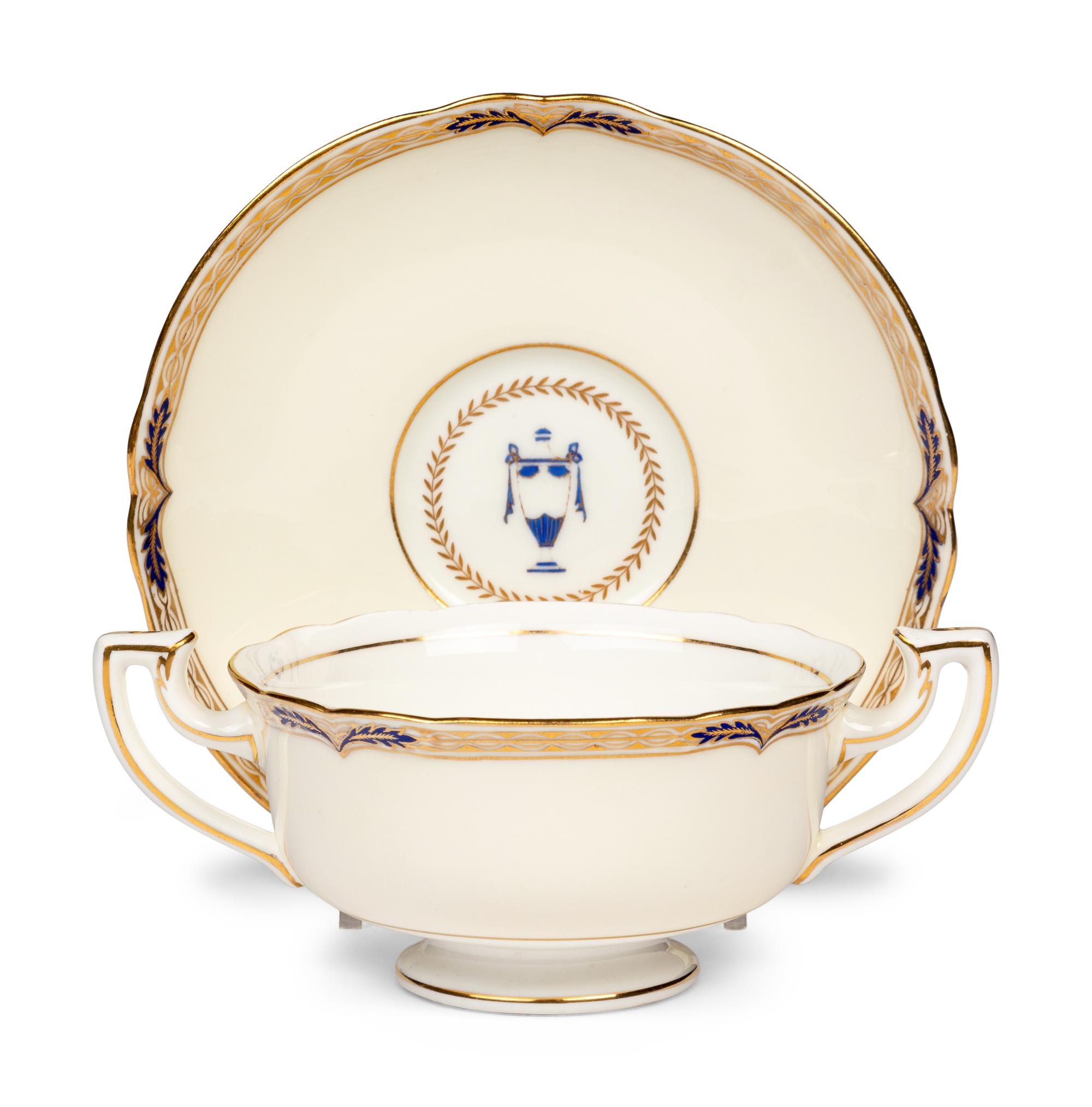 A Minton Porcelain Dinner Service