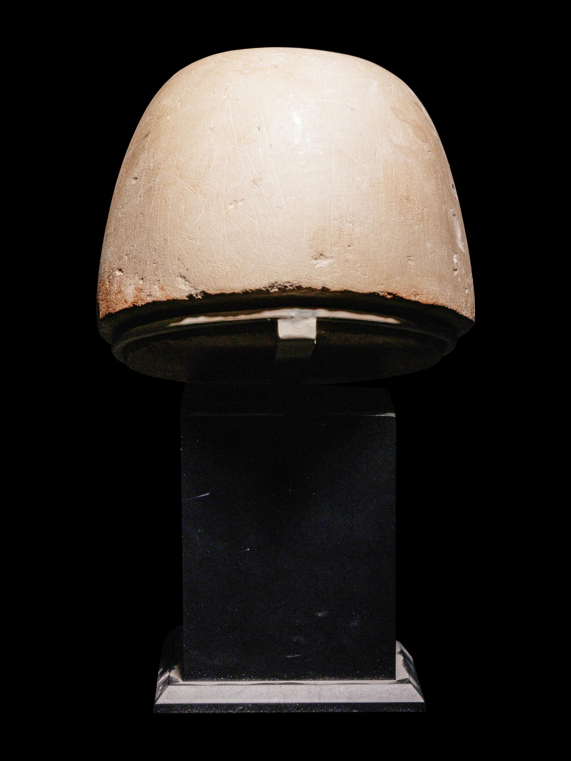 An Egyptian Stone Canopic Jar Lid