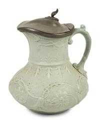 A Collection of Eight English Salt Glazed Relief Form Pitchers and Molded Earthenware — 19TH CENTURY