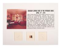 [LINCOLN, Abraham (1809-1865)]. Strands of hair attributed to Abraham and Mary Todd Lincoln displayed with wallpaper from room in which he died at the Peterson House.
