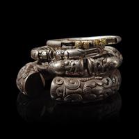 Six Chinese Silver 'Dragon' Bracelets, Qing Dynasty 清 銀龍頭紋鐲六隻