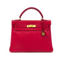 An Hermes Red 32cm Kelly Bag, 12.5" x 9" x 4.5".