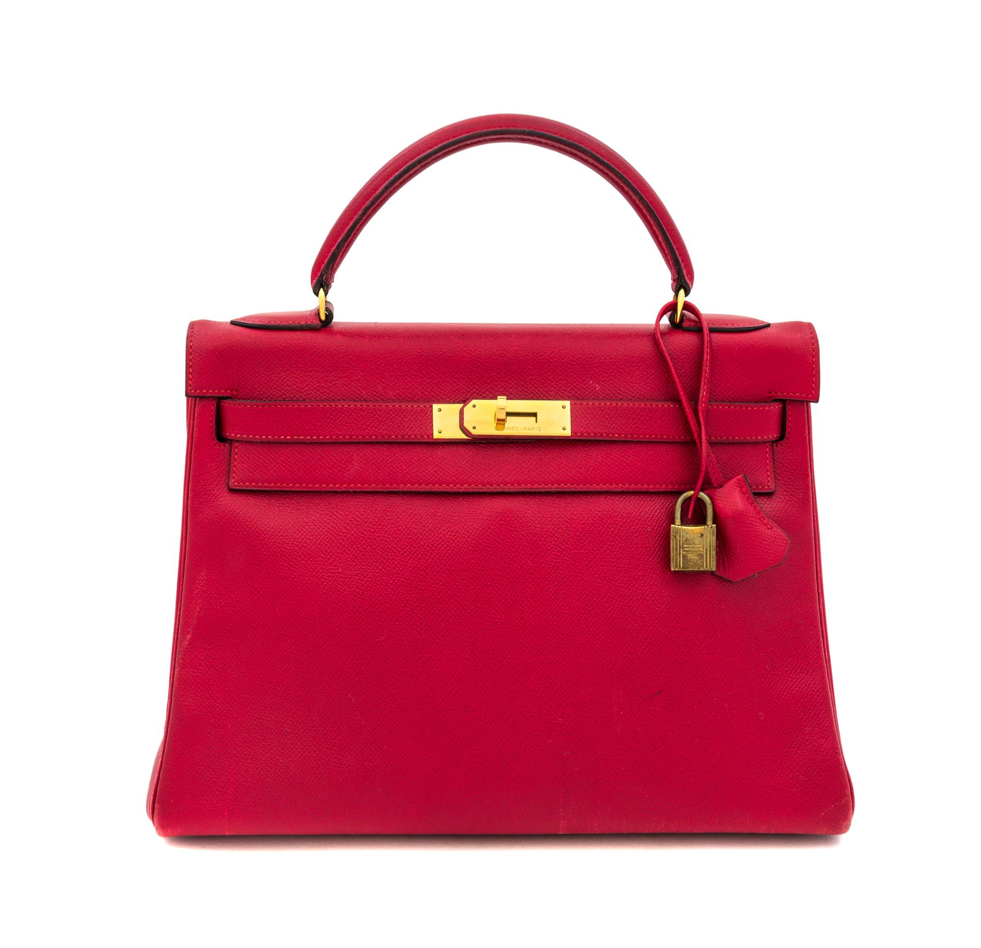 An Hermes Red 32cm Kelly Bag, 12.5" x 9" x 4.5".
