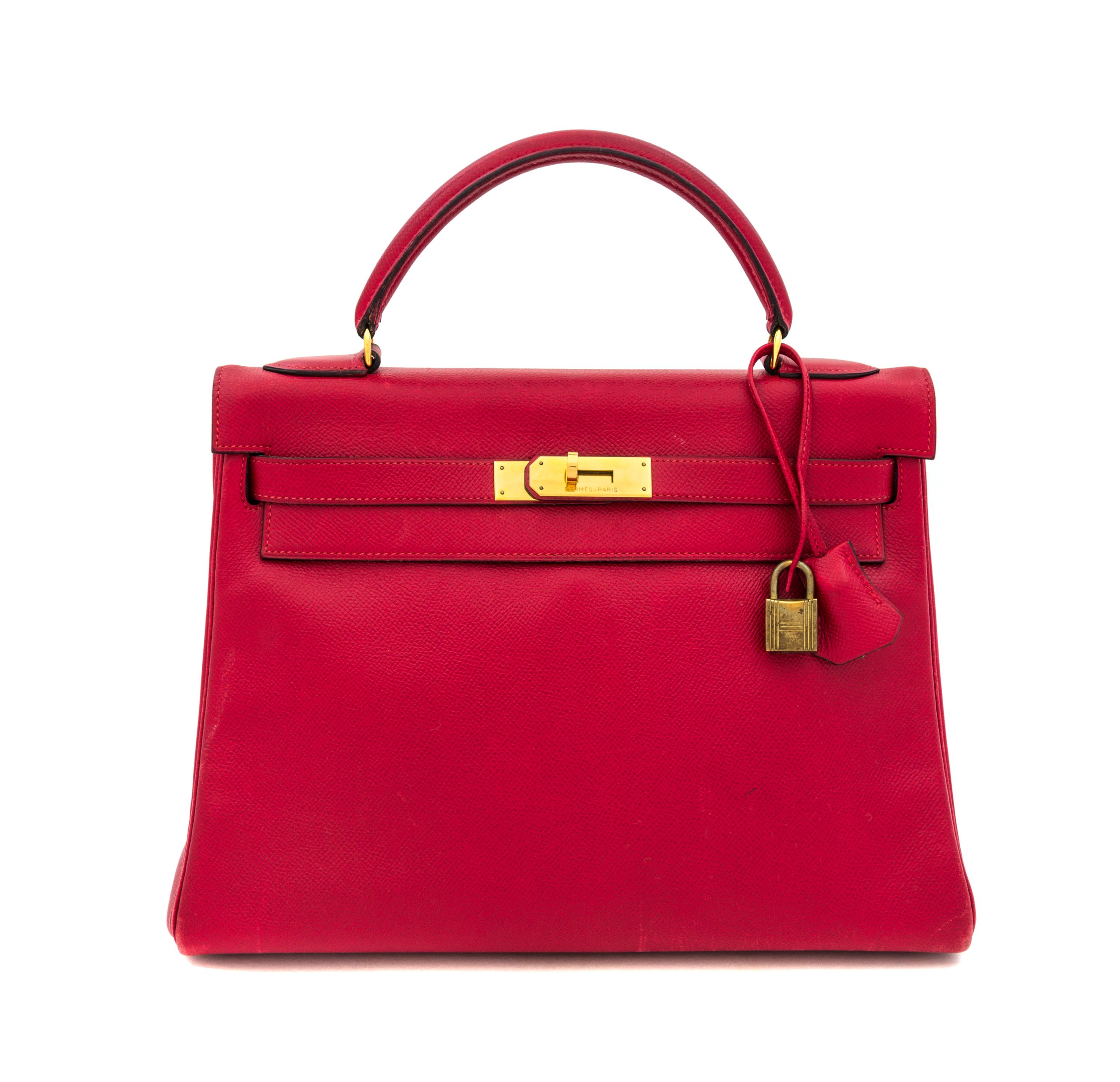 An Hermes Red 32cm Kelly Bag, 12.5" x 9" x 4.5".
