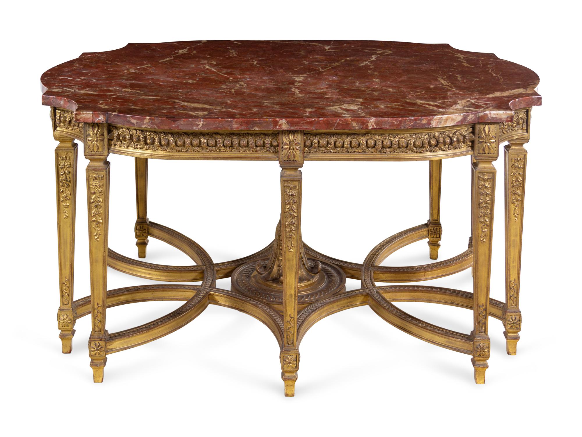 A Louis XVI Style Carved Giltwood Center Table