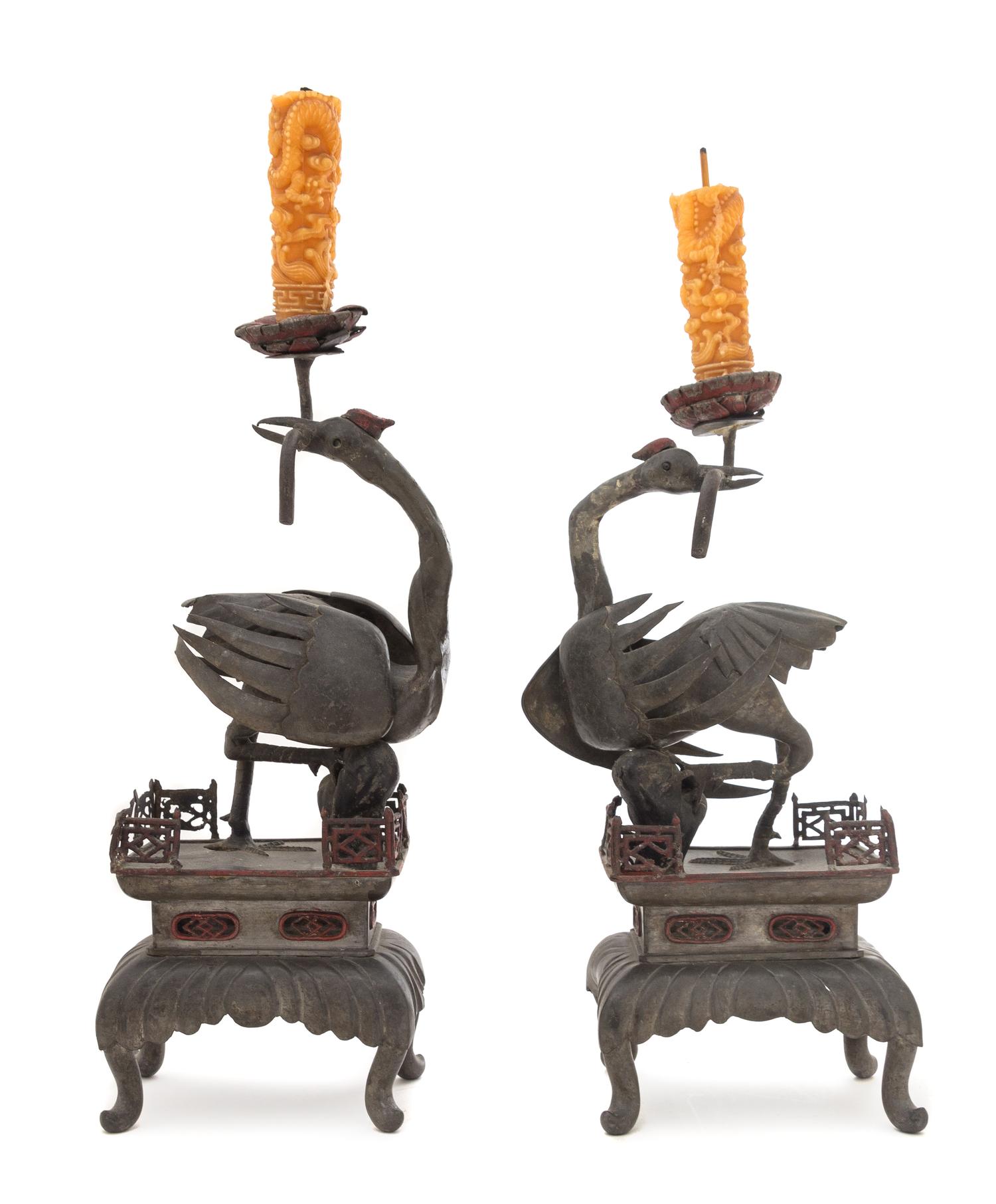A Pair of Pewter Crane-Form Candle Holders Height of each 16 inches. — 19TH CENTURY
