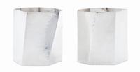 A Pair of Danish Modernist Silver Cups, Rey Urban for Age Fausing, Copenhagen, each of heptagonal form with irregular paneled sides.