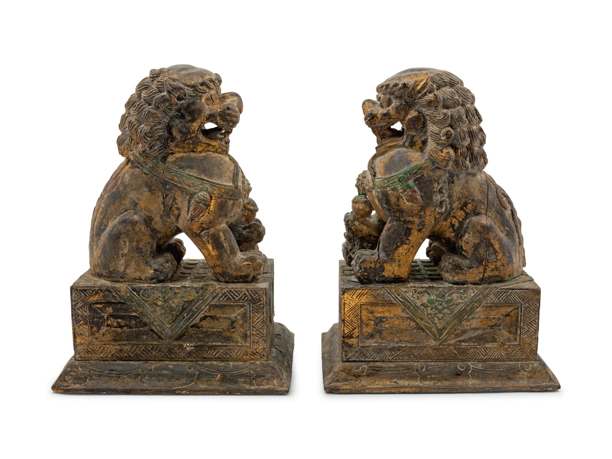 A Pair of Carved Wood Fu Lions