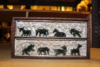 A Set of Eight Spinach Jade Horses. Height of tallest 1 3/4 inches.