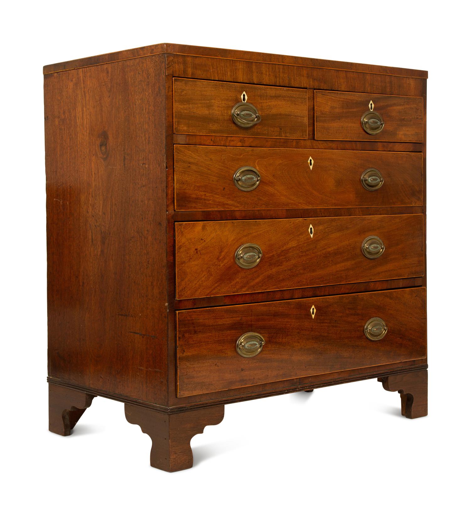 A Regency Style Walnut Chest of Drawers — 19TH CENTURY