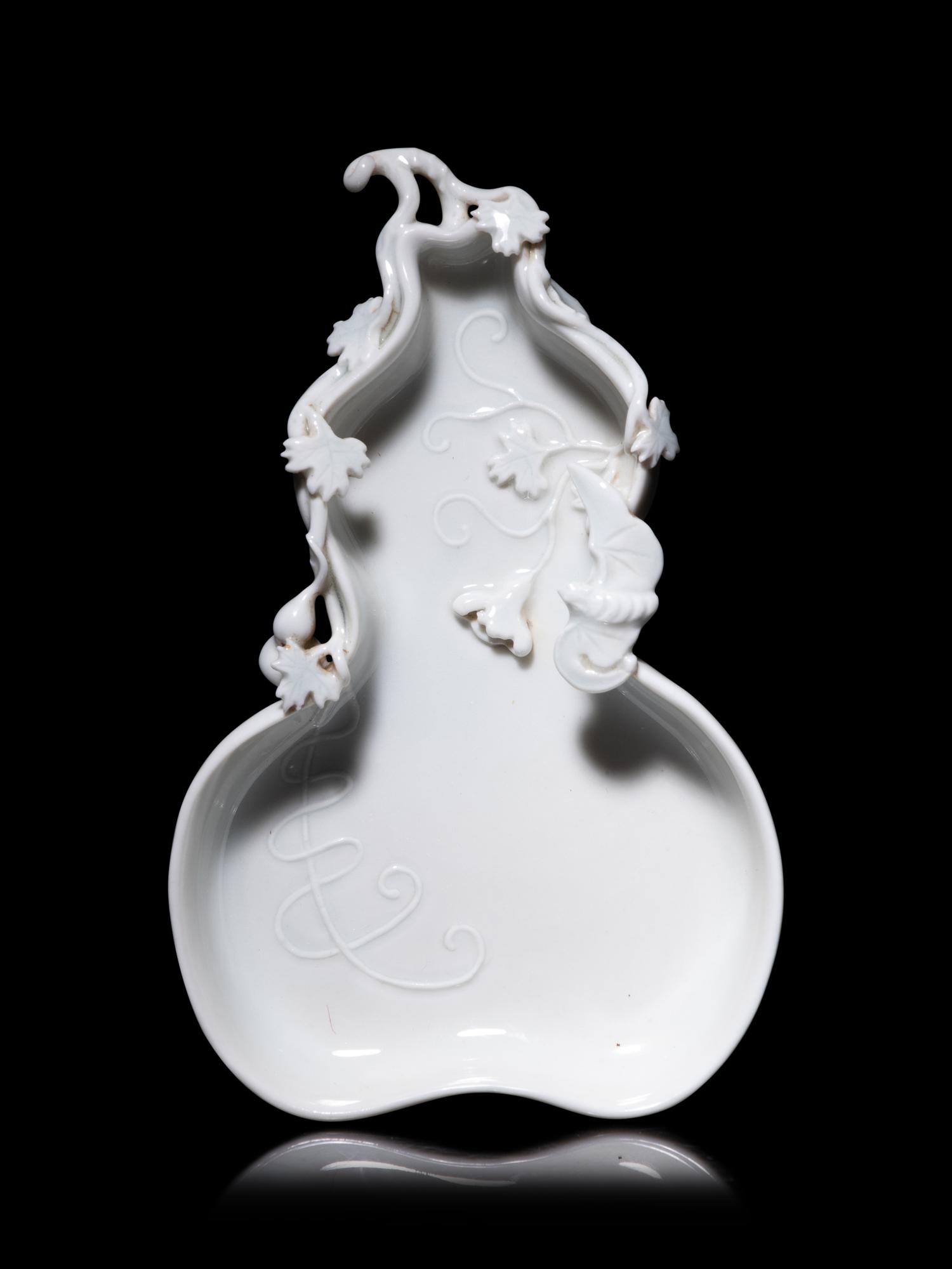 A Chinese White Glazed Porcelain Gourd-Form Brush Washer