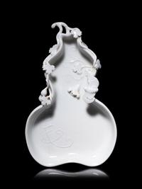 A Chinese White Glazed Porcelain Gourd-Form Brush Washer