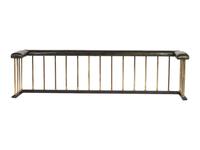 A Brass and Leather Club Fireplace Bench