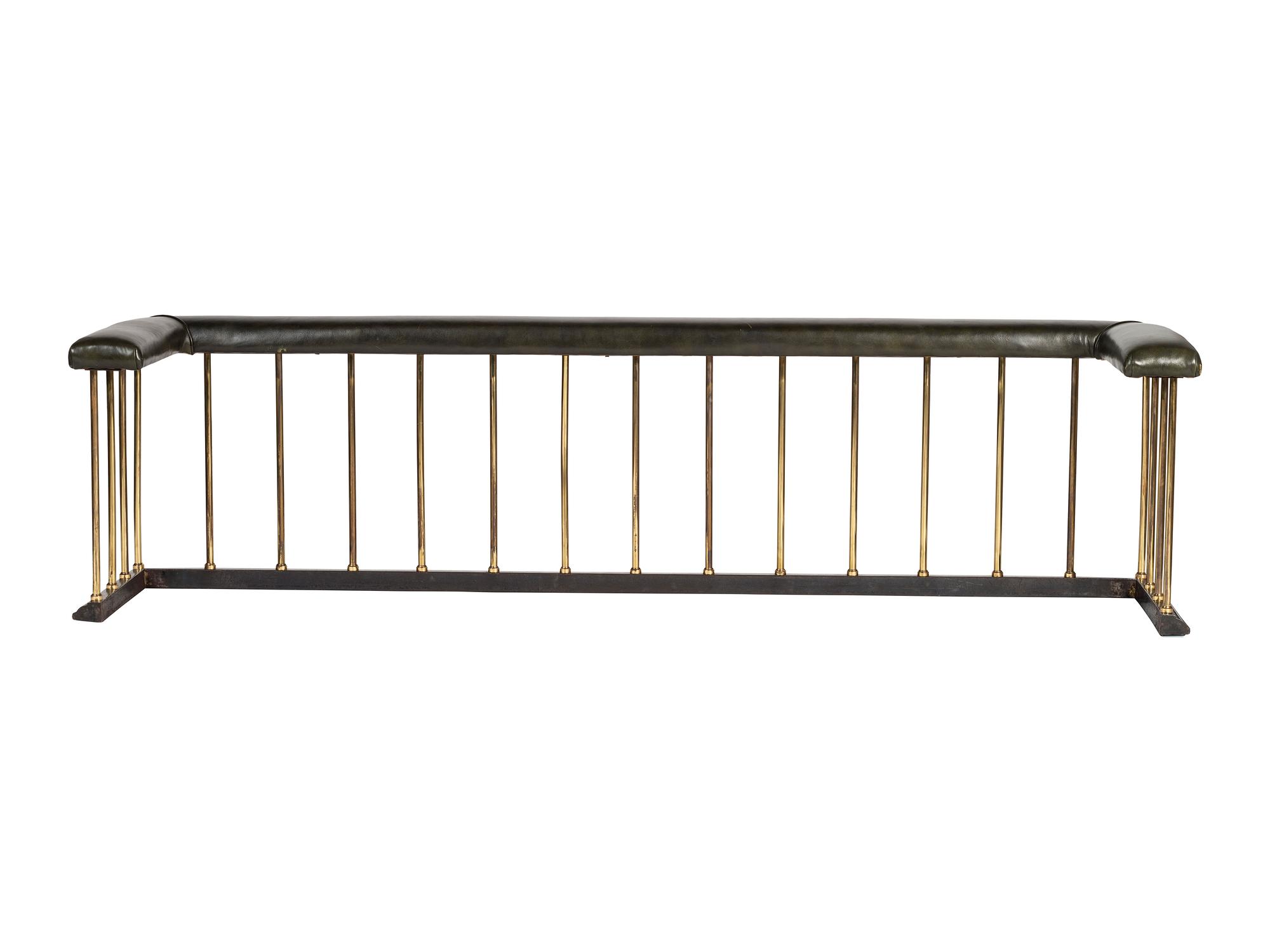 A Brass and Leather Club Fireplace Bench