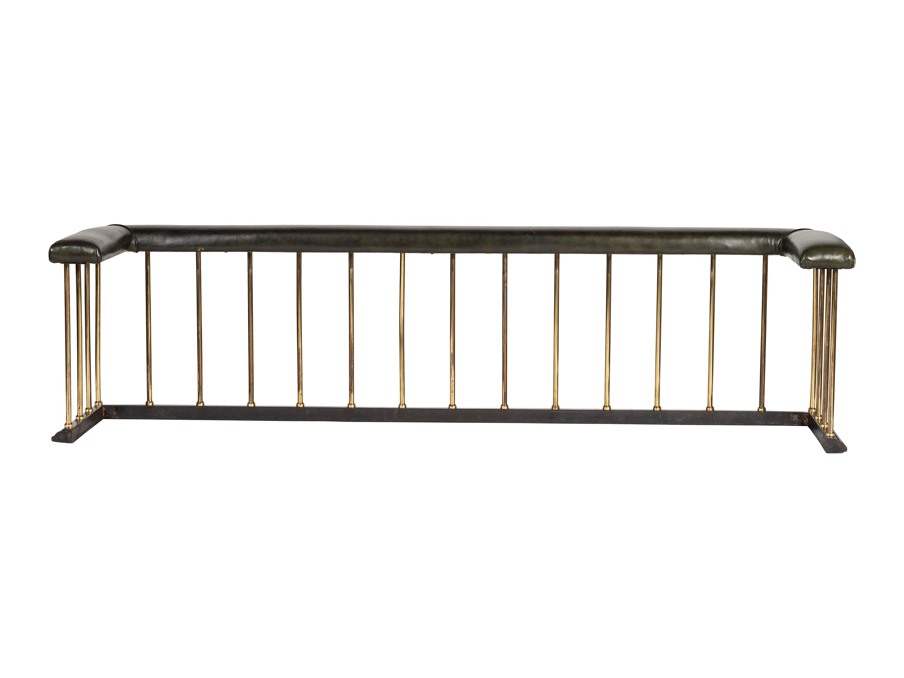 A Brass and Leather Club Fireplace Bench