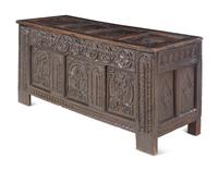 A Charles II Style Carved Oak Coffer
