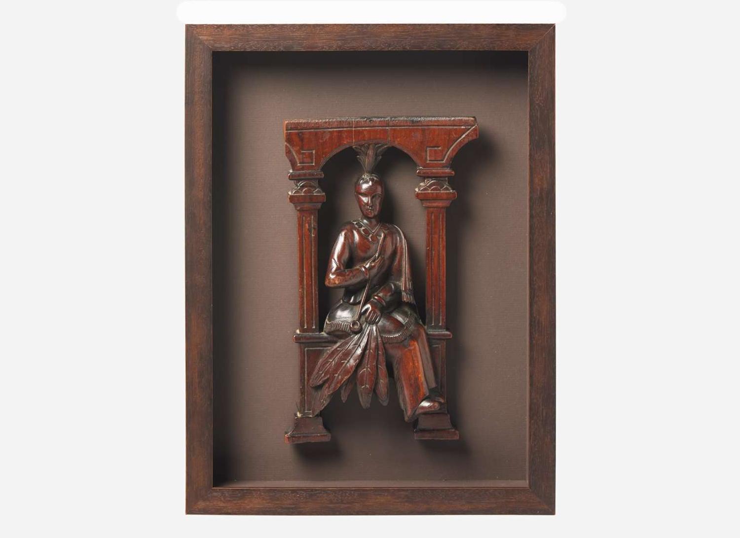 A carved architectural element of an American Indian with a Pipe, South Carolina, 19th century